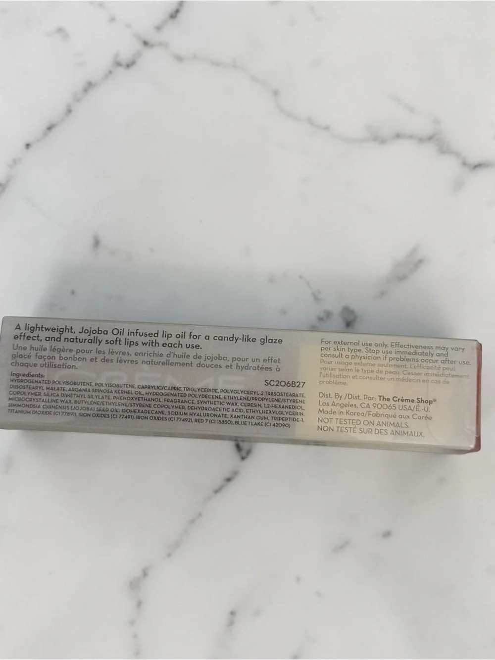 The Crème Shop Tinted Jelly Lip Oil Elixir - Yellow Pink